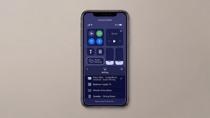 iPhone Control Center AirPlay menu showing Roku device option